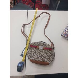 Tommy Hilfiger cross body canvas signature print adjustable strap leather trim